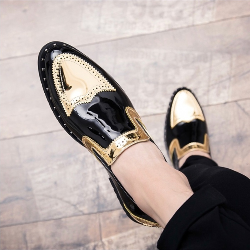 Men’s slip on shoes.  Black and gold.